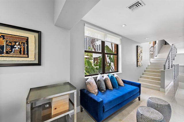 living area with light tile patterned floors