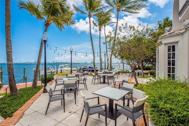 view of patio / terrace featuring a water view