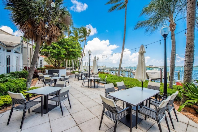 view of patio featuring a water view