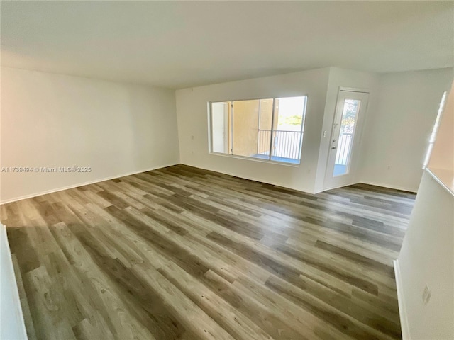 empty room featuring hardwood / wood-style floors