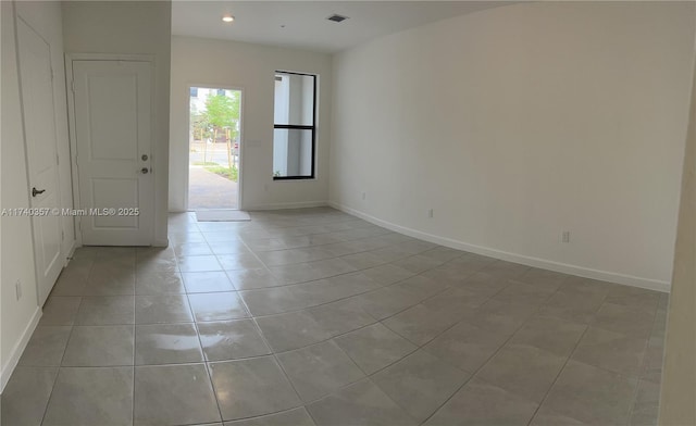 view of tiled spare room