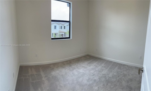 spare room with carpet floors