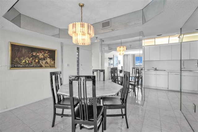 dining area with a textured ceiling