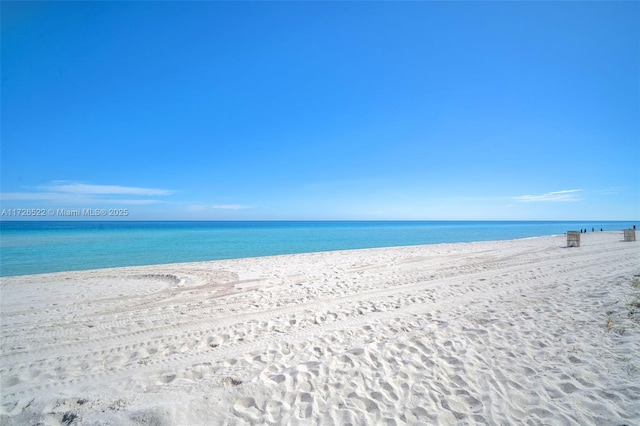 view of water feature featuring a beach view