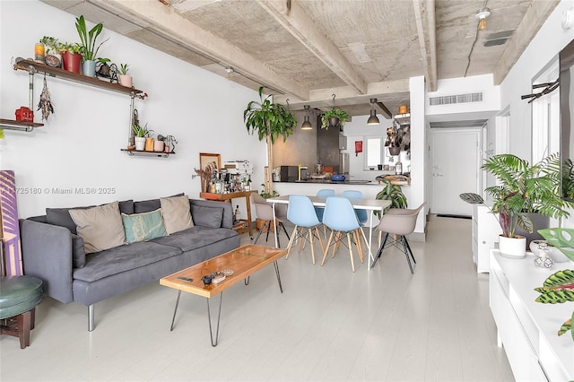 living room with light hardwood / wood-style floors