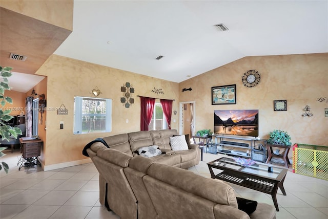 tiled living room featuring vaulted ceiling