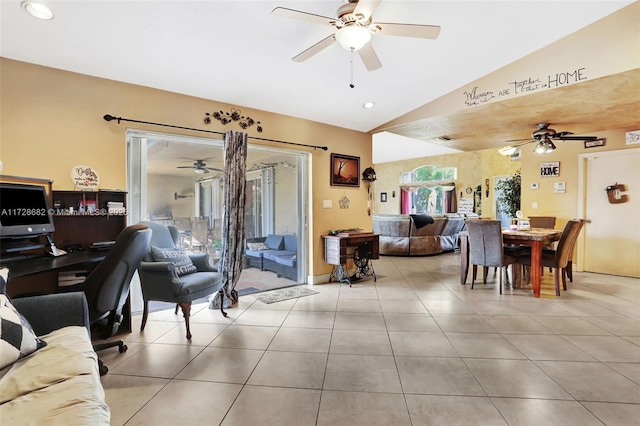 living room with vaulted ceiling, ceiling fan, and light tile patterned flooring