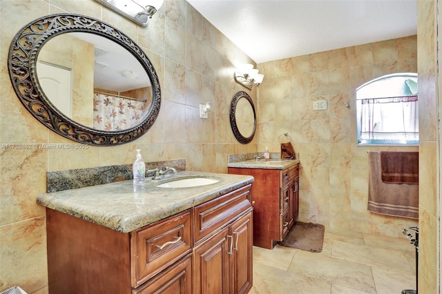 bathroom with tile walls and vanity