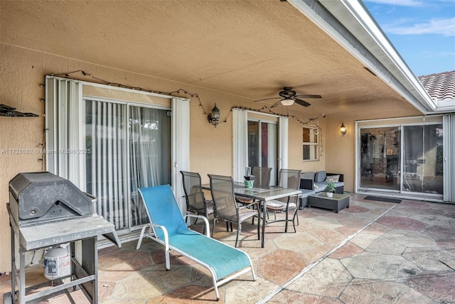 view of patio / terrace with ceiling fan and area for grilling