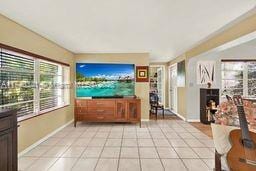 living room featuring light tile patterned floors