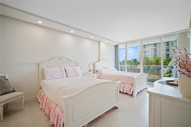 bedroom featuring access to outside and light tile patterned floors