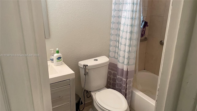 full bathroom featuring vanity, shower / tub combo with curtain, and toilet