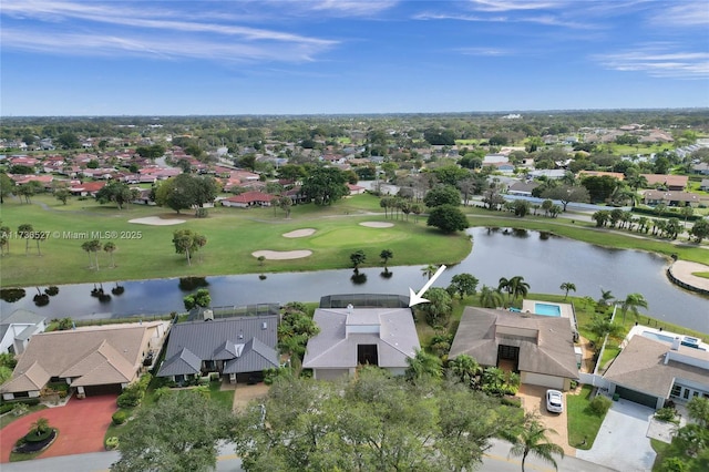 aerial view with a water view, a residential view, and golf course view