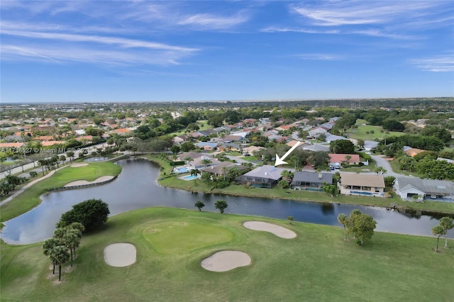 bird's eye view featuring view of golf course, a water view, and a residential view