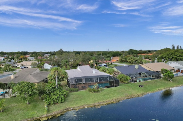 aerial view featuring a residential view and a water view