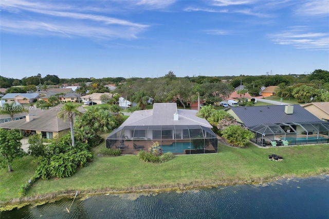 bird's eye view featuring a water view and a residential view