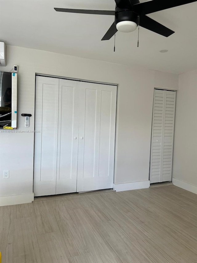 15281 SW 153rd St, Miami, FL 33187 - unfurnished bedroom with light wood-type flooring, baseboards, and a ceiling fan