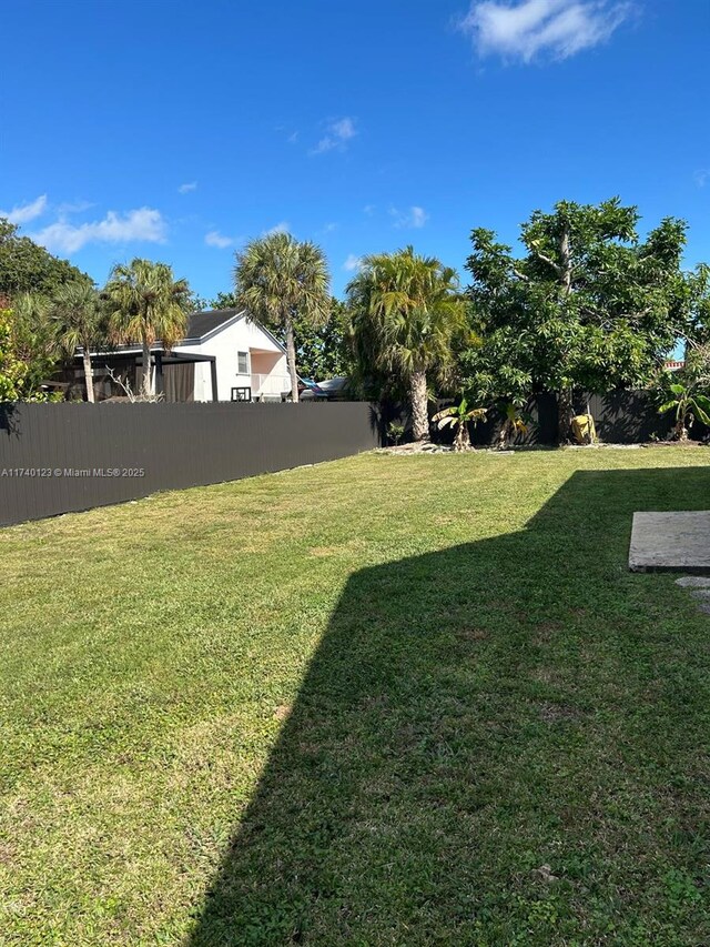 15281 SW 153rd St, Miami, FL 33187 - view of yard featuring fence