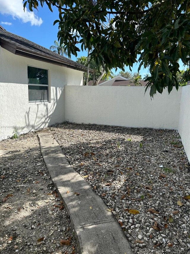 15281 SW 153rd St, Miami, FL 33187 - view of yard featuring fence