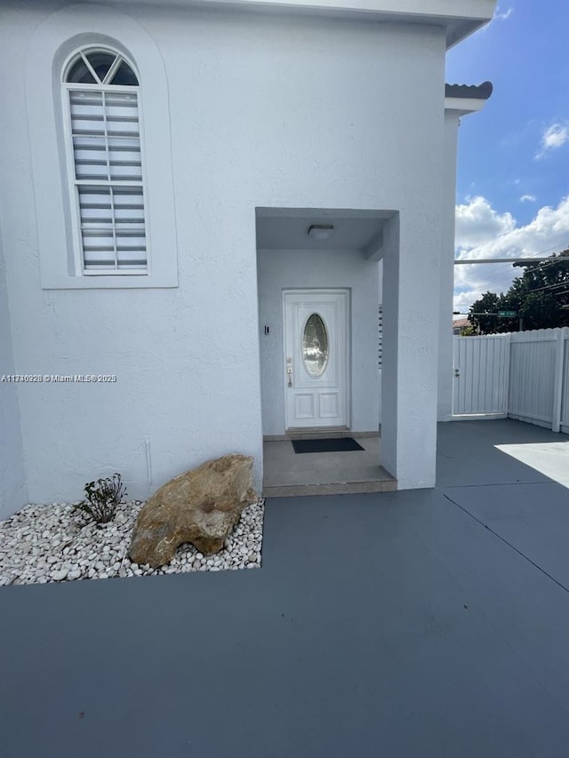 12676 NW 7th Ln, Miami, FL 33182 - entrance to property featuring stucco siding