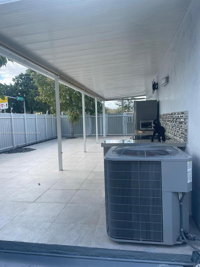 view of patio / terrace featuring central air condition unit