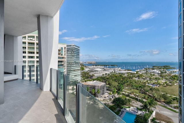 balcony featuring a water view