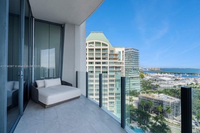 balcony featuring a water view