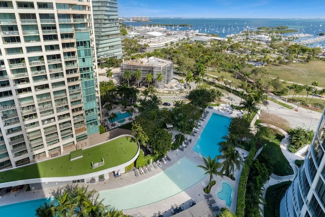 birds eye view of property with a water view