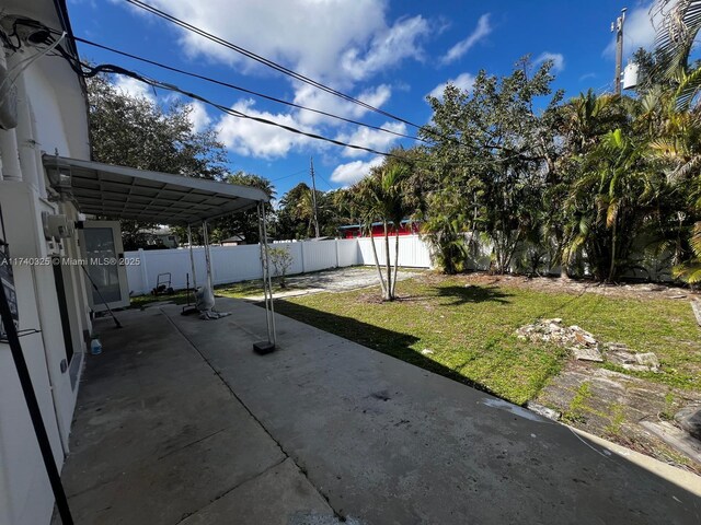222 SW 8th St, Dania Beach, FL 33004 - view of yard featuring a patio