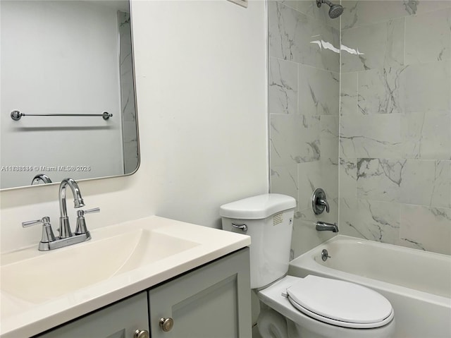 full bathroom featuring vanity, toilet, and tiled shower / bath