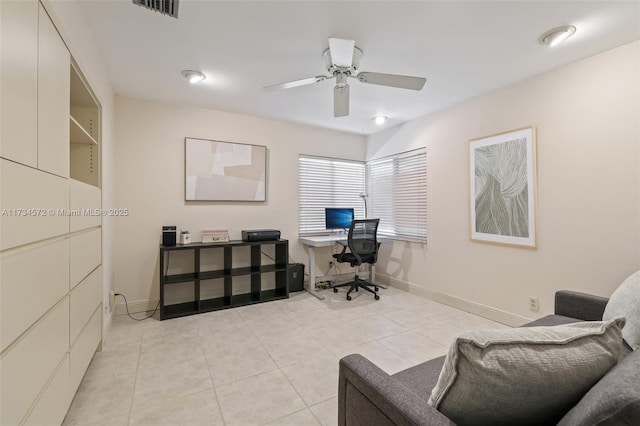 office featuring light tile patterned flooring and ceiling fan