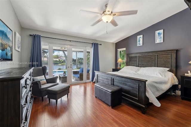 bedroom featuring french doors, vaulted ceiling, dark hardwood / wood-style flooring, ceiling fan, and access to exterior