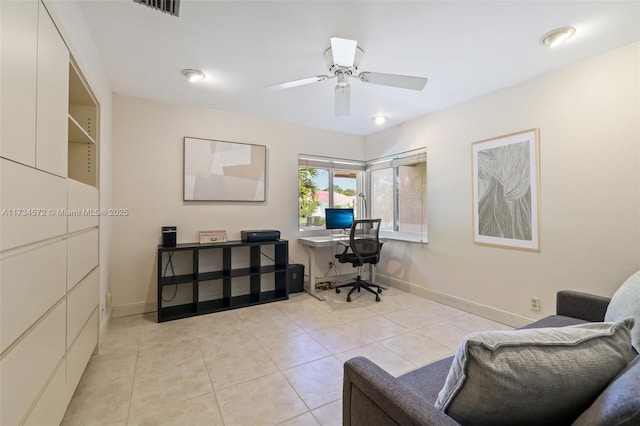 office space featuring light tile patterned floors and ceiling fan