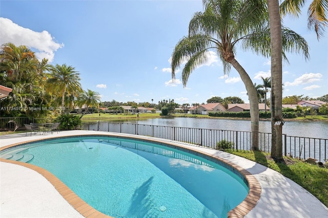 view of pool featuring a water view