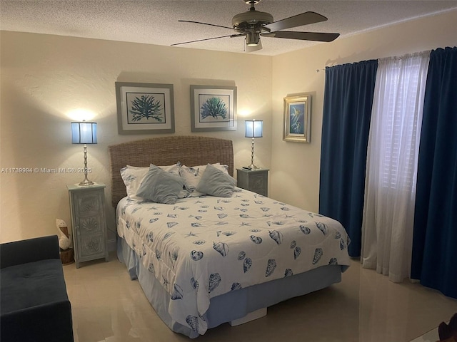 bedroom with ceiling fan, light colored carpet, and a textured ceiling