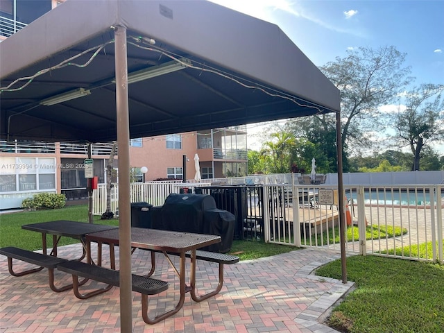 view of patio / terrace featuring a grill