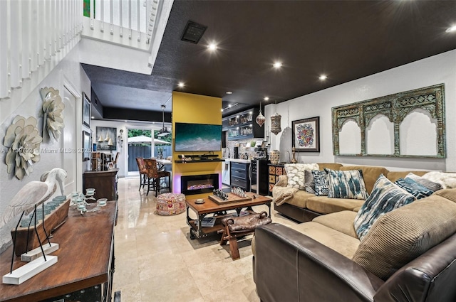 living room featuring light tile patterned floors