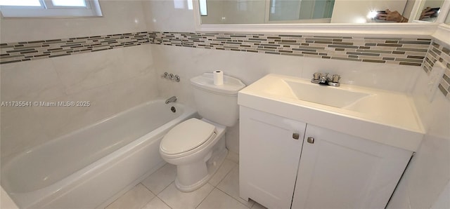 full bathroom featuring toilet, vanity, tile patterned flooring, and shower / bath combination