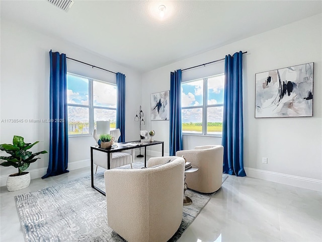 home office featuring plenty of natural light