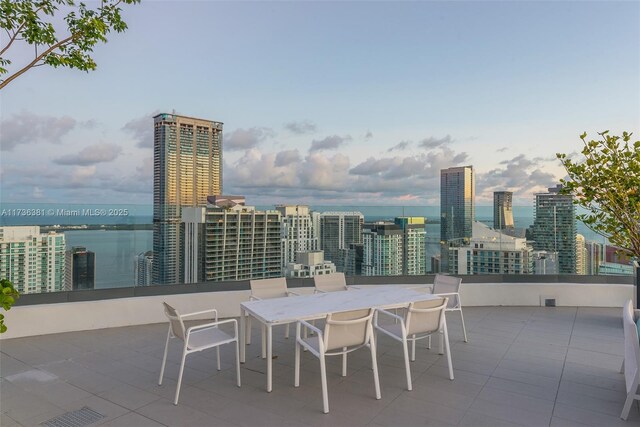 view of patio / terrace featuring a water view