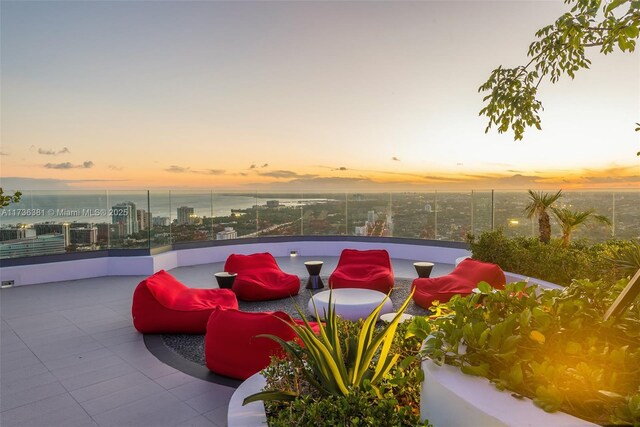 view of pool at dusk