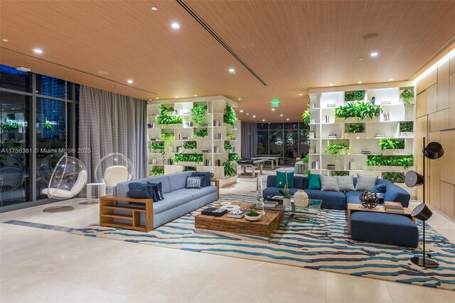 interior space with wood ceiling and expansive windows