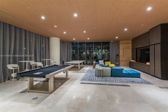 rec room with wood ceiling, billiards, and expansive windows