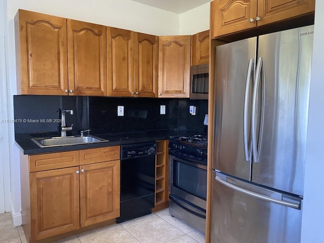 kitchen with sink, backsplash, stainless steel appliances, and light tile patterned flooring