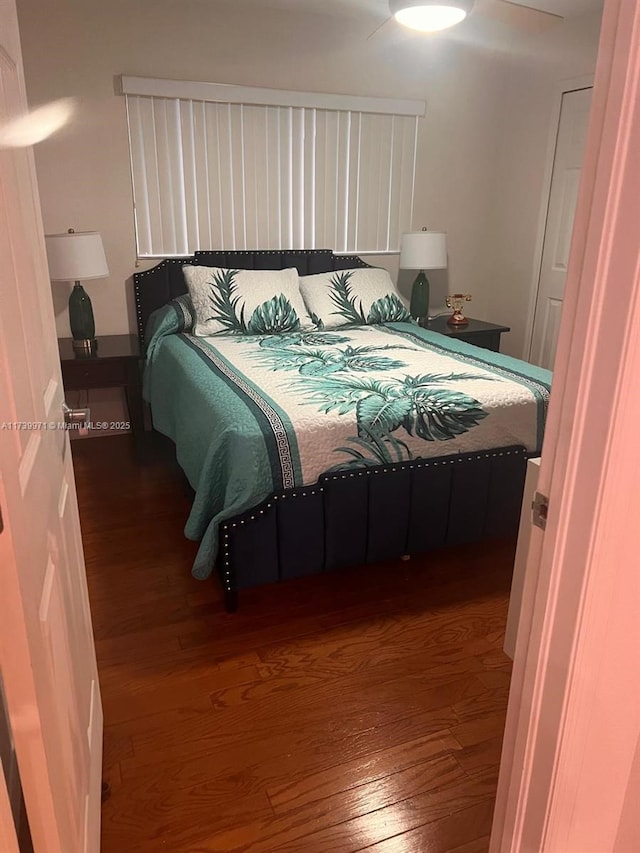 bedroom featuring wood finished floors