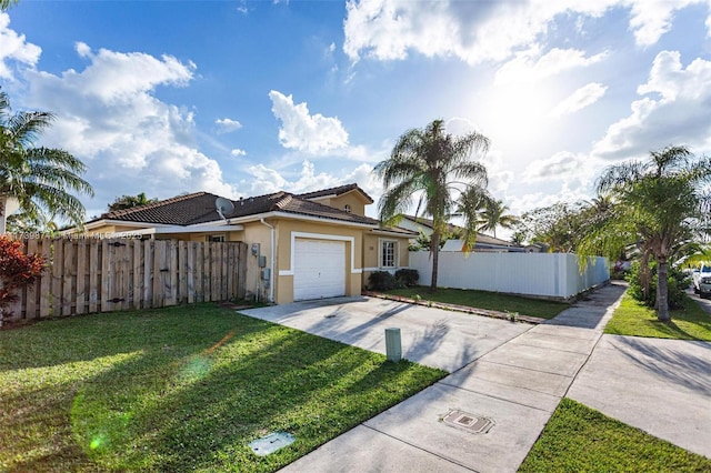 ranch-style home featuring a garage and a front yard