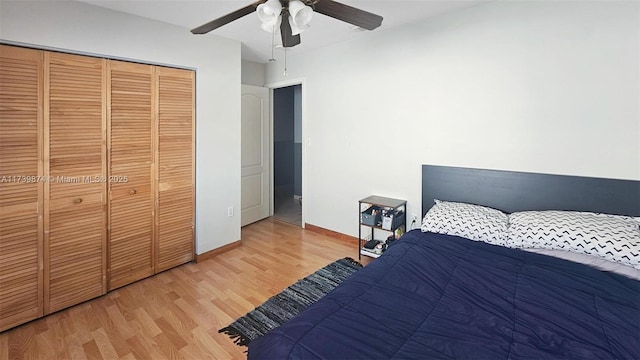 bedroom with hardwood / wood-style flooring, ceiling fan, and a closet