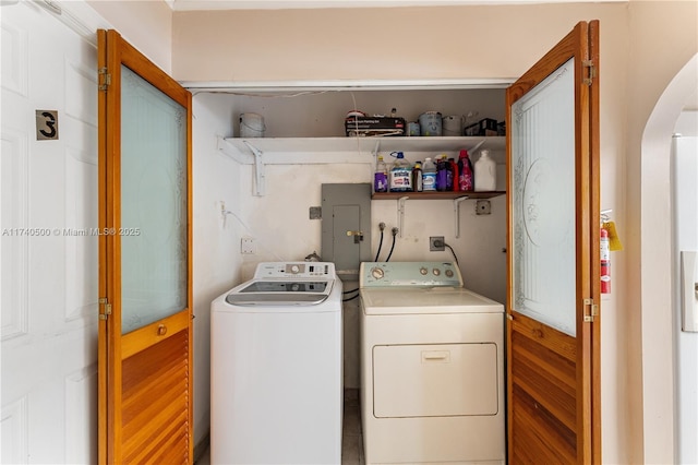 washroom with independent washer and dryer