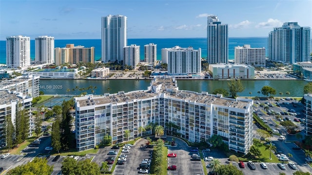 birds eye view of property featuring a water view