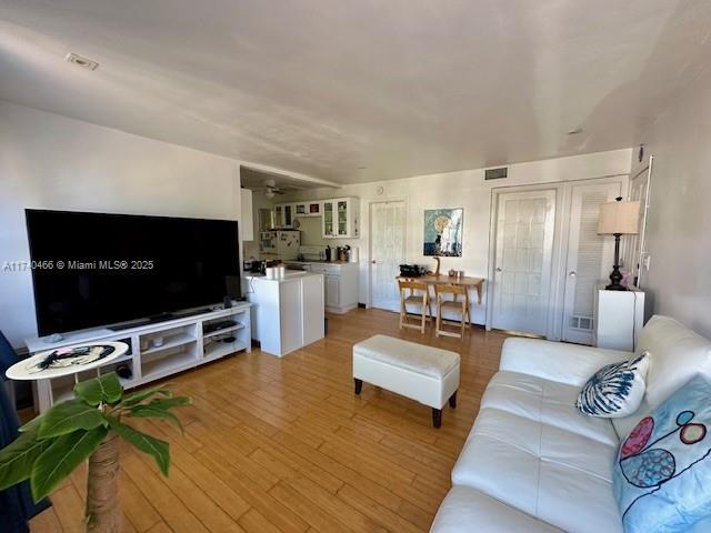 living room with hardwood / wood-style floors